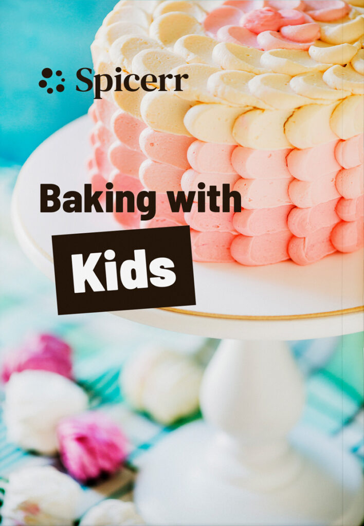 Colorful cake on stand with "Spicerr: Baking with Kids" text overlay. Floral accents around base add a festive touch to the scene.